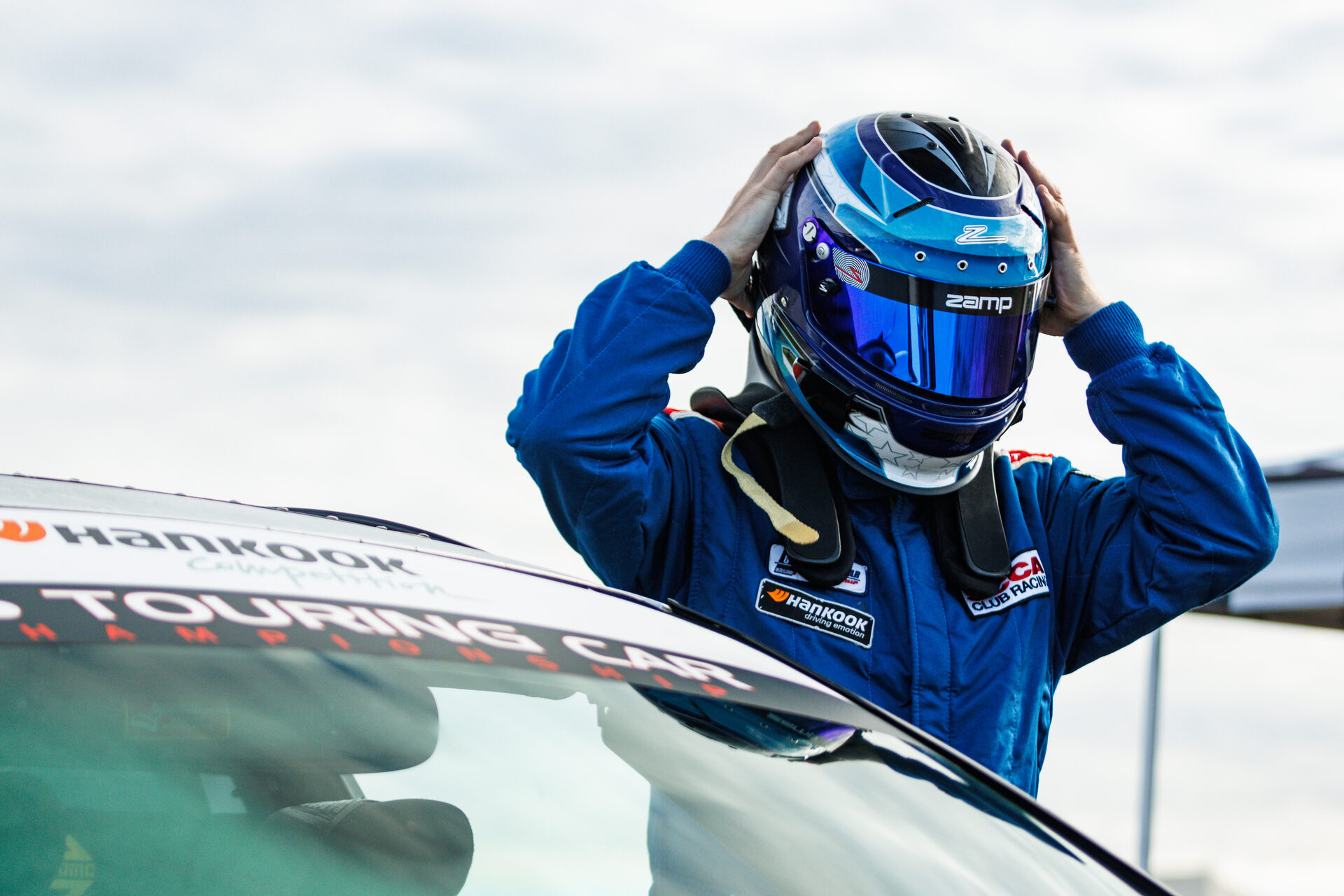 Mike McLaughlin putting on his helmet