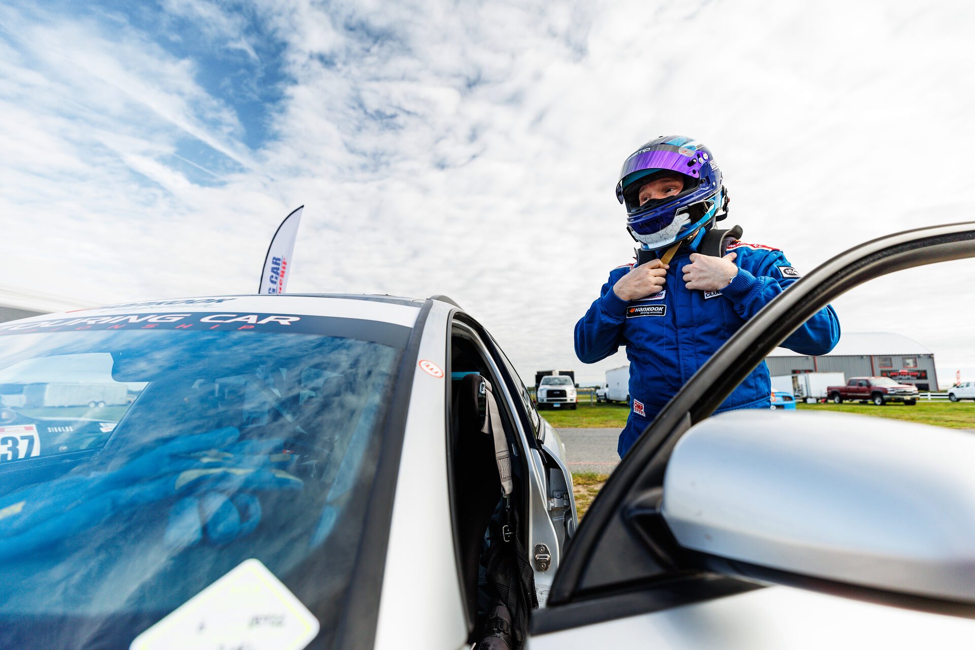 Mike McLaughlin suiting up before a race